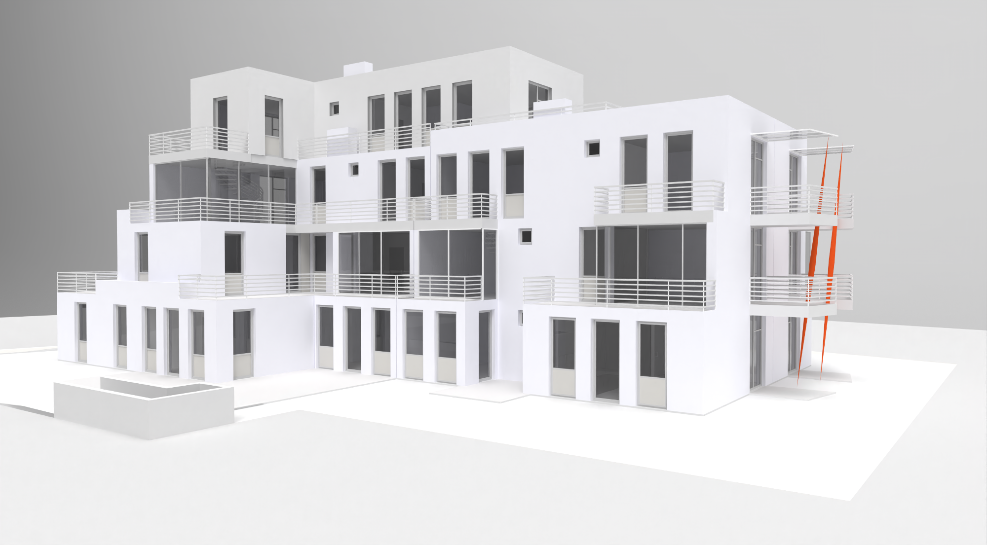 Grasyscale building with red pillars